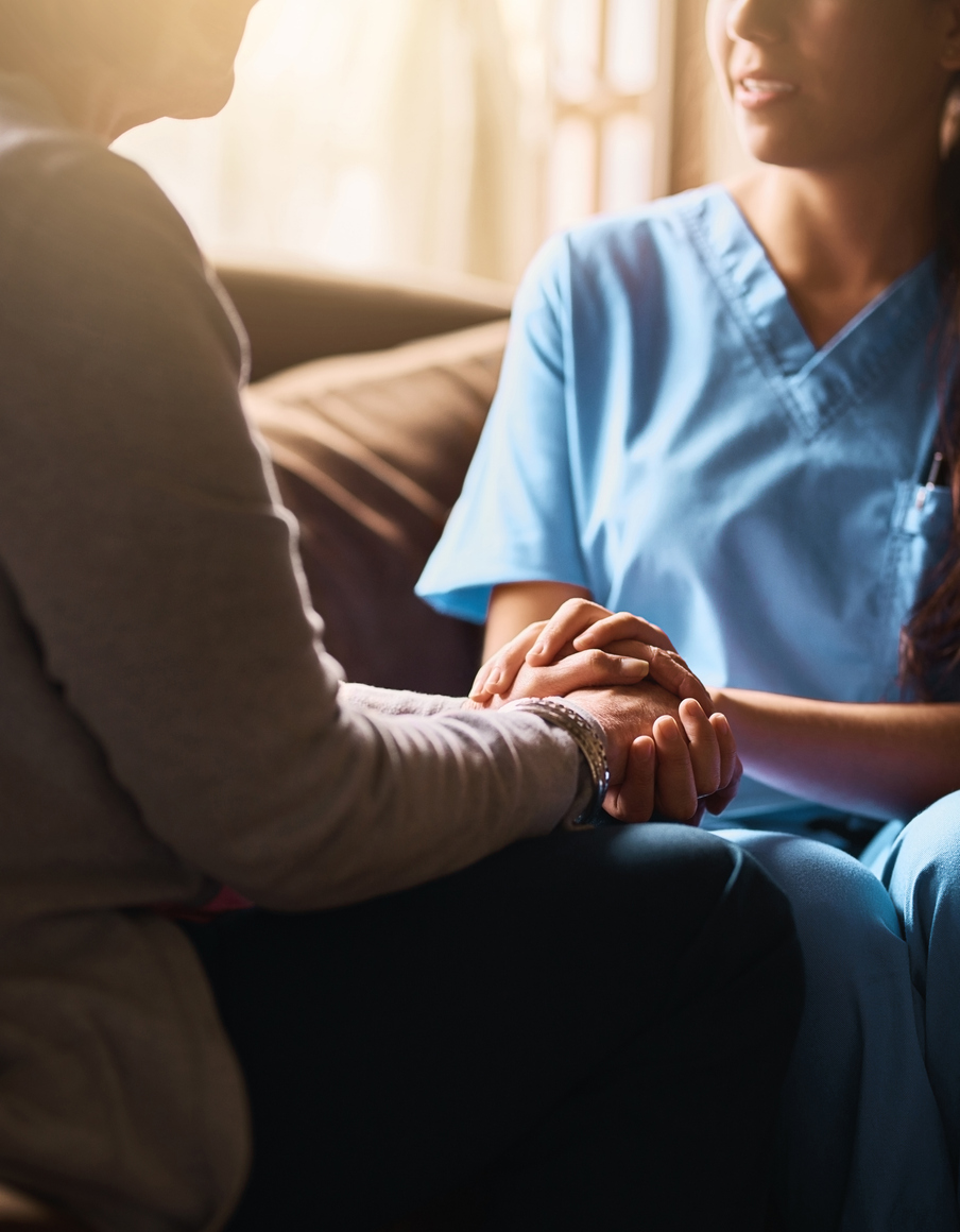 Compassionate senior care advisor and family member offering support and guidance.